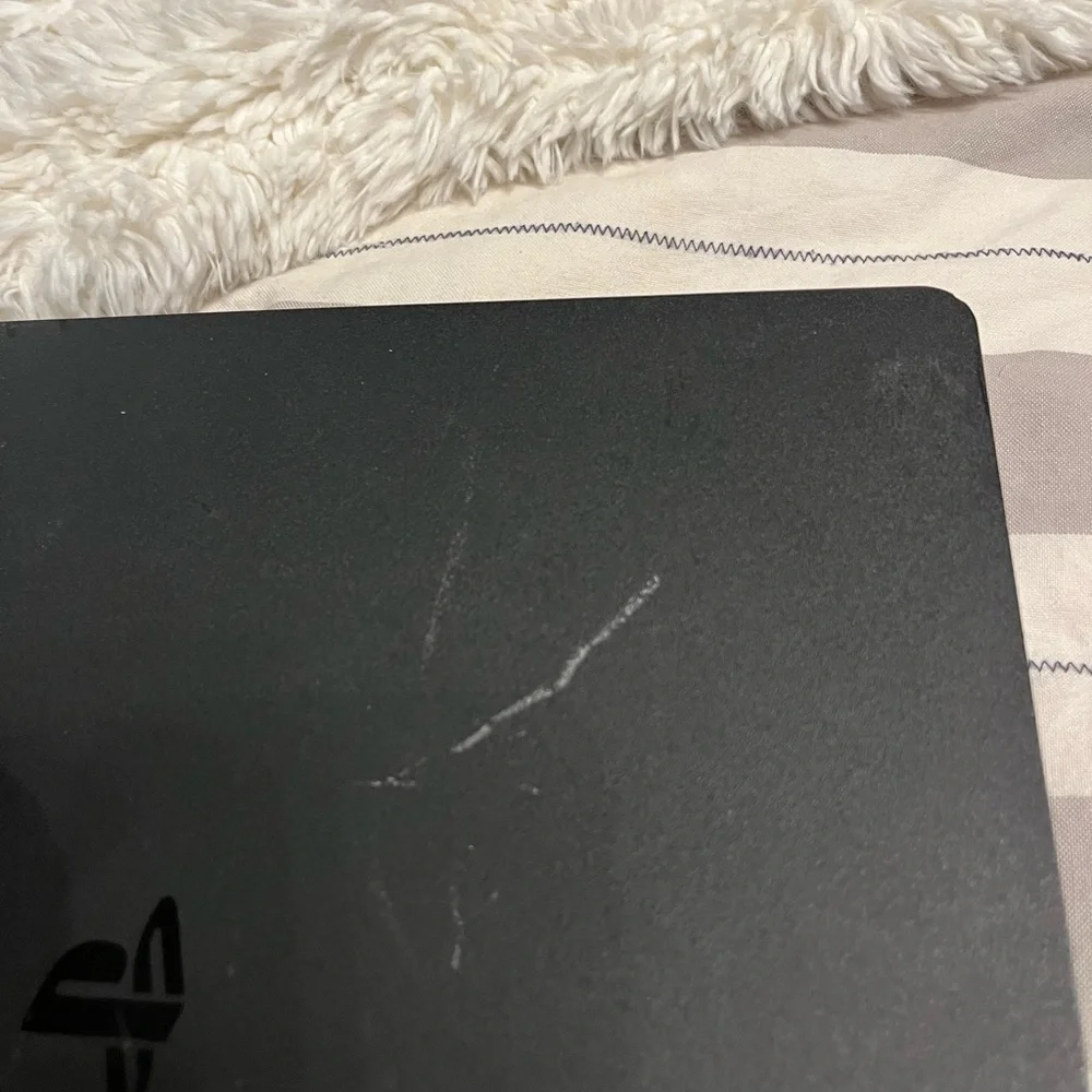 Sony Console with Black Controller